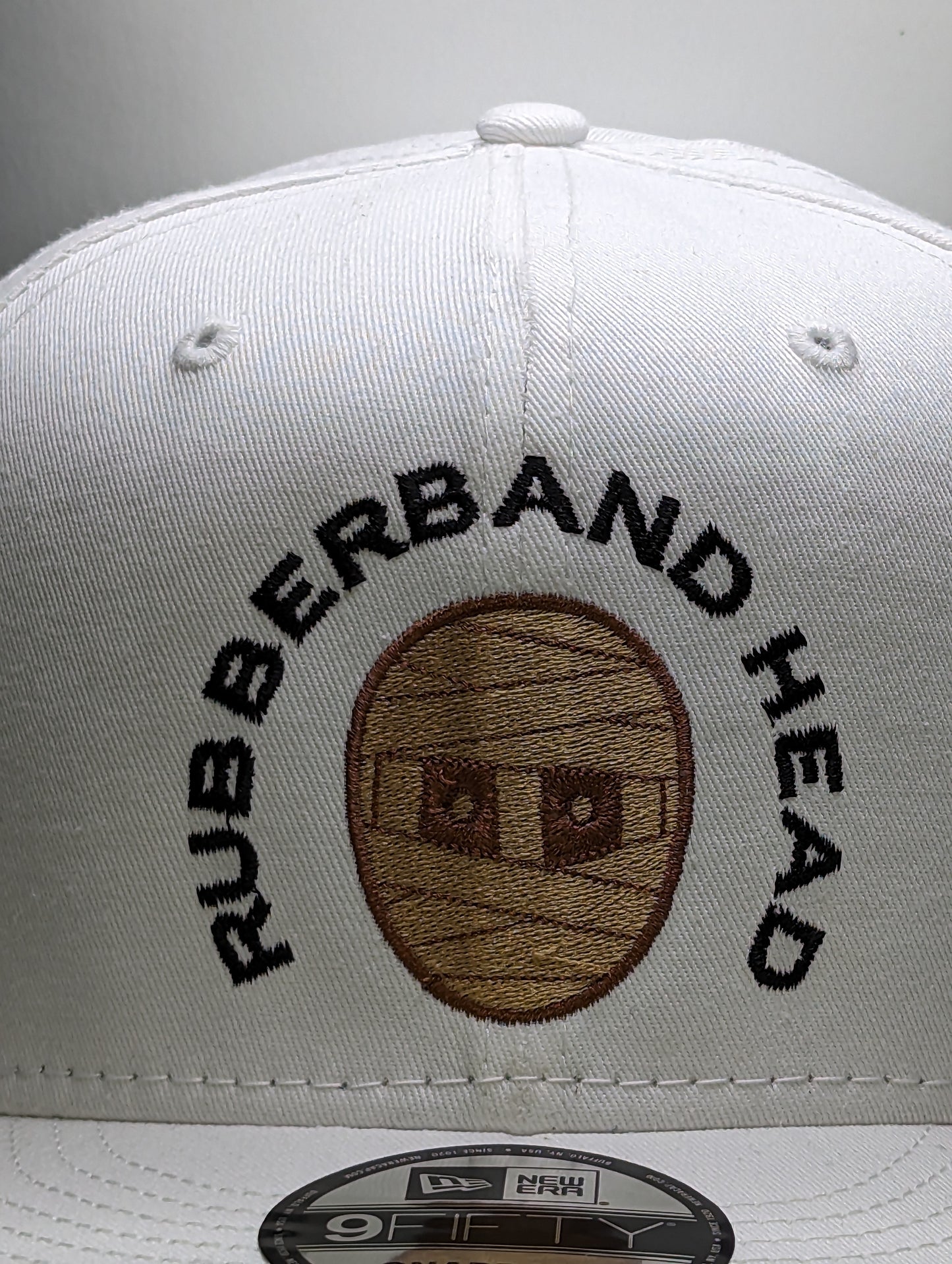 WHITE RUBBERBAND HEAD 9FIFTY