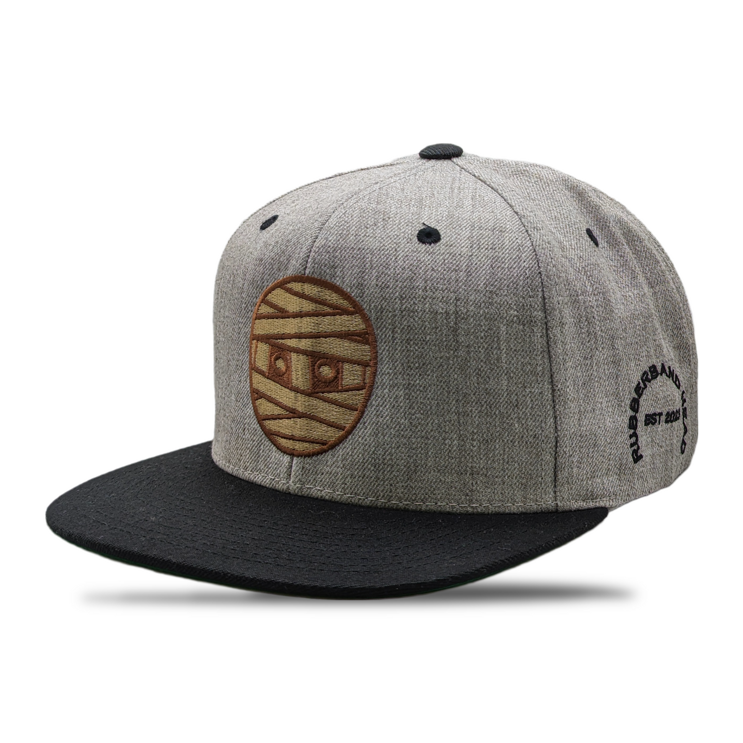 SNAPBACK CON CABEZA DE GOMA GRIS / NEGRO