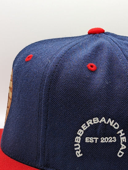 NAVY / RED RUBBERBAND HEAD SNAPBACK -LOW IN STOCK-