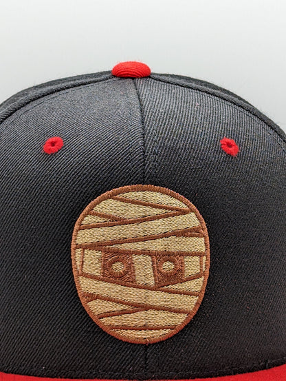 BLACK / RED RUBBERBAND HEAD SNAPBACK