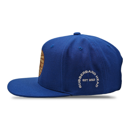 SNAPBACK CON CABEZA DE GOMA AZUL REAL